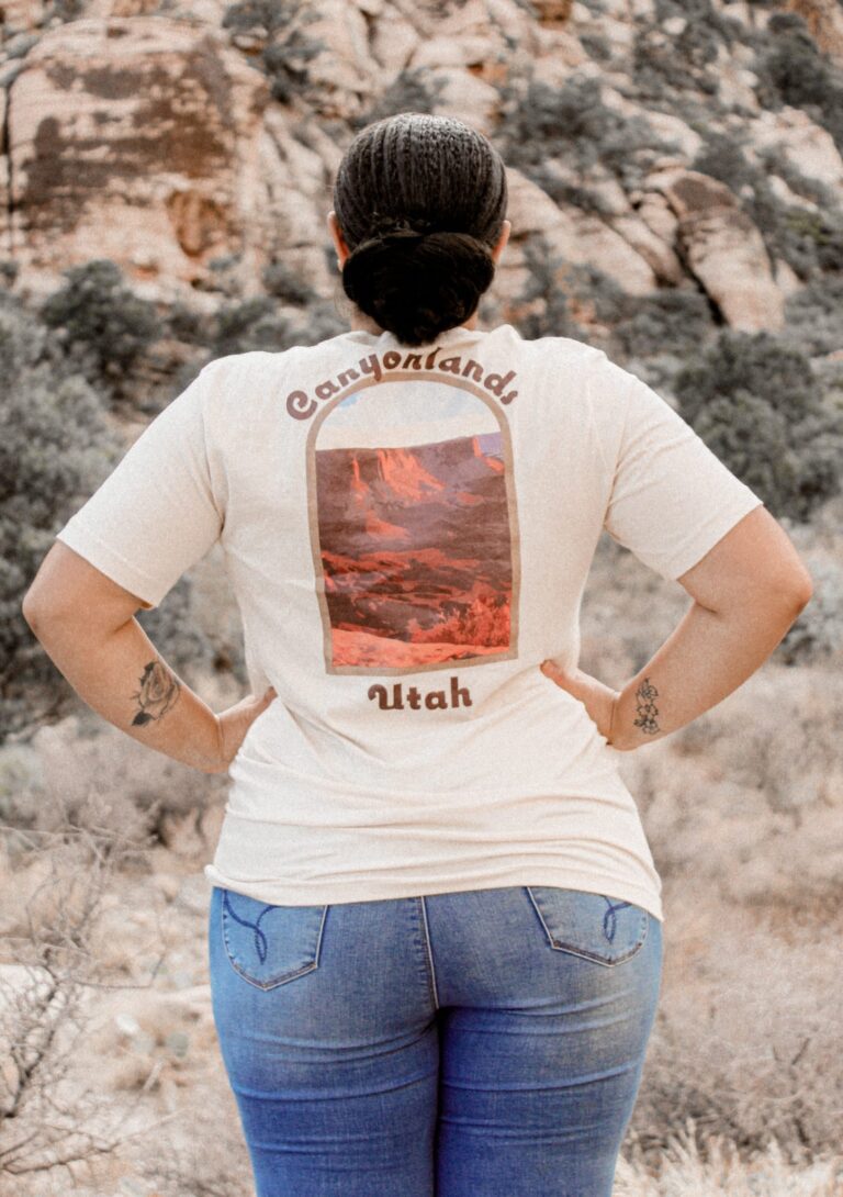 Woman in the mountains, with Canyonlands shirt