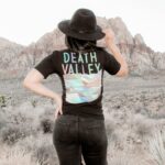 Woman in nature with Death Valley shirt on